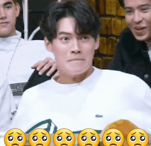 A Man In A White Shirt Is Surrounded By Smiley Faces GIF