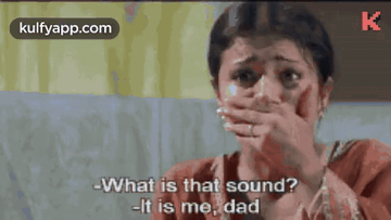A Man In A White Shirt Is Talking To Another Man In A Red Shirt . GIF