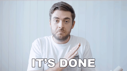A Man In A White Shirt Says It 'S Done With His Arms Outstretched GIF