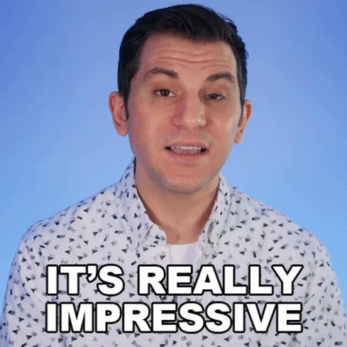 A Man In A White Shirt Says It 'S Really Impressive On A Blue Background GIF