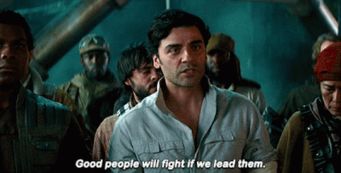A Man In A White Shirt Stands In Front Of A Crowd And Says Good People Will Fight If We Lead Them GIF
