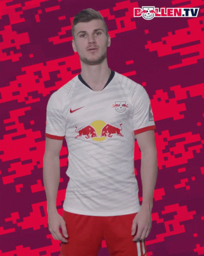 A Man In A White Shirt With Red Bulls On It GIF