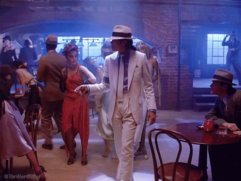White Suit Man Dancing With People GIF