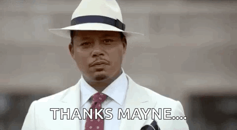 A Man In A White Suit And Hat Is Giving A Thanks Mayne . GIF
