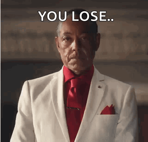 A Man In A White Suit And Red Tie With The Words You Lose Above Him GIF