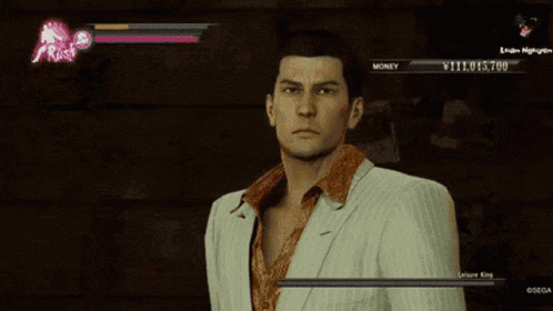 A Man In A White Suit Is Playing A Video Game With A Lion King In The Background GIF