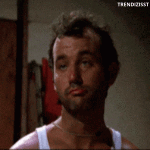 Man Brushing Teeth With Red Toothpaste GIF