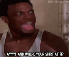 A Man In A White Tank Top Is Making A Funny Face And Saying `` And Where Your Shirt At ? '' . GIF