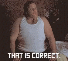 A Man In A White Tank Top Is Sitting On A Bed With The Words That Is Correct Behind Him GIF