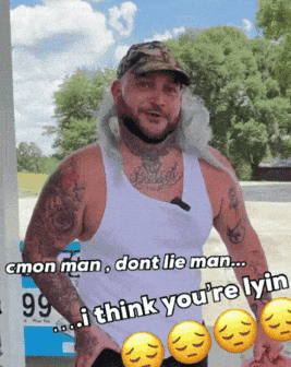 A Man In A White Tank Top Is Standing In Front Of A Gas Pump That Says 99 Cents GIF
