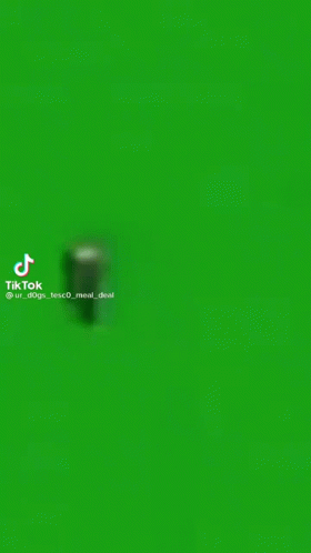 A Man In A White Tank Top Says Uwu On A Green Background GIF