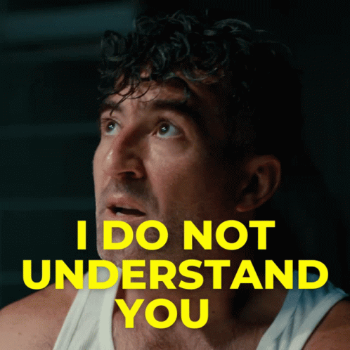 A Man In A White Tank Top With The Words I Do Not Understand You Behind Him GIF