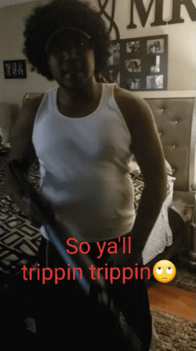 A Man In A White Tank Top With The Words So Ya 'Ll Trippin Trippin Below Him GIF