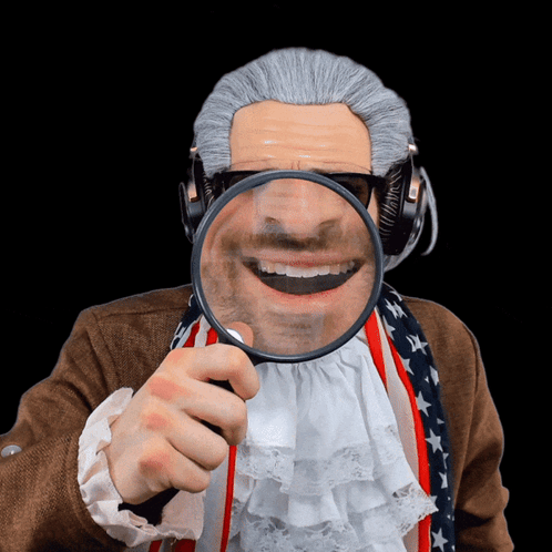 A Man In A Wig And Headphones Is Holding A Magnifying Glass In Front Of His Face GIF