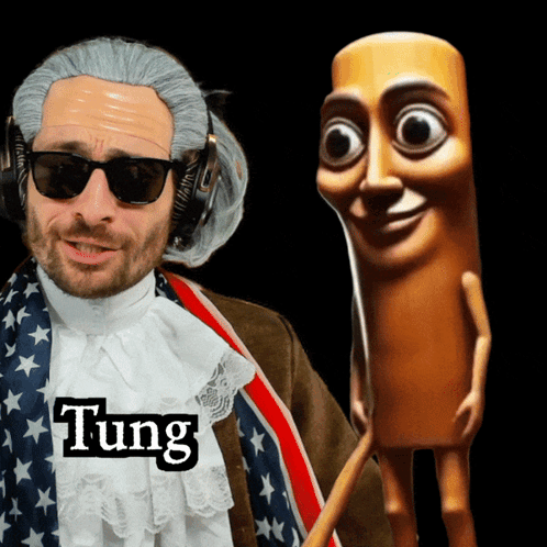 A Man In A Wig And Sunglasses Is Standing Next To A Wooden Stick With The Name Tung On It GIF