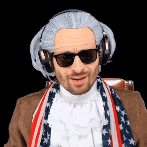 A Man In A Wig And Sunglasses Is Wearing Headphones And A Scarf GIF