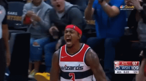 A Man In A Wizards Jersey Is Screaming GIF