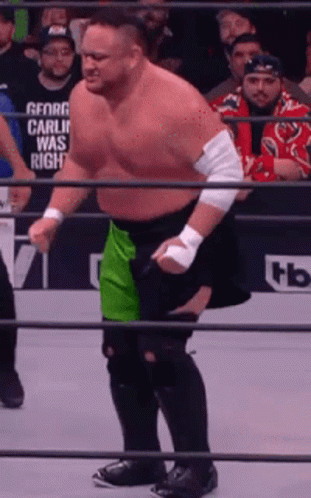 A Man In A Wrestling Ring With A Shirt That Says Carlin Was Right GIF