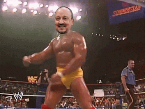 A Man In A Wrestling Ring With A Sign That Says Summerslam GIF