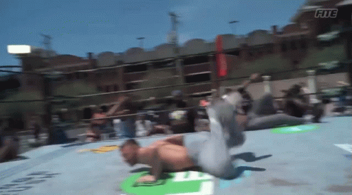 a man in a wrestling ring with the word fitc on the bottom right