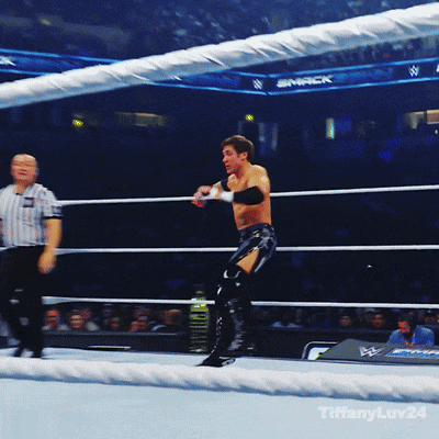 A Man In A Wrestling Ring With The Word Smack On The Wall GIF