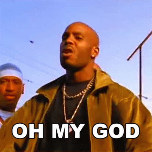 A Man In A Yellow Jacket Is Standing In Front Of A Sign That Says Oh My God GIF