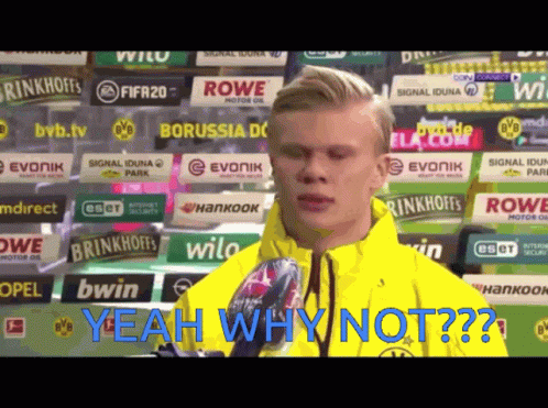A Man In A Yellow Jacket With The Words Yeah Why Not Written On The Bottom GIF