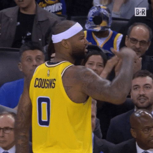 A Man In A Yellow Jersey With The Number 0 On It GIF