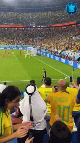 a man in a yellow jersey with the number 10