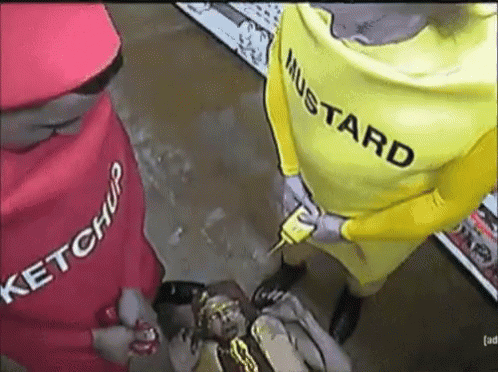 A Man In A Yellow Mustard Costume Holds A Mustard Bottle GIF