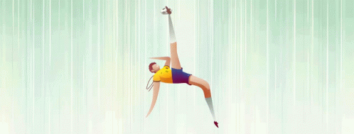 a man in a yellow shirt and blue shorts is jumping in the air