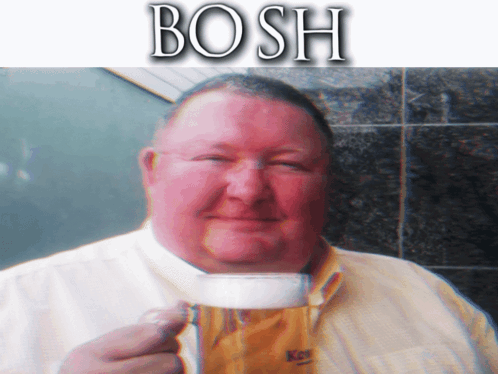 A Man In A Yellow Shirt Is Holding A Cup Of Coffee With The Word Bosh Written Above Him GIF