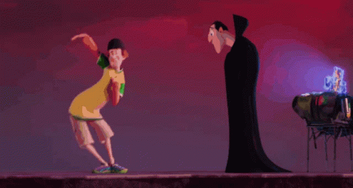 Man In Yellow Shirt Kneeling Before Vampire GIF