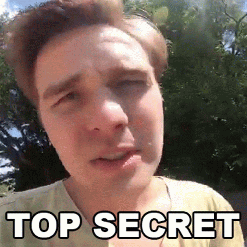 A Man In A Yellow Shirt Is Making A Funny Face And The Words Top Secret Are Above Him GIF