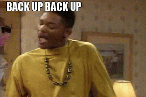 Man Making Funny Face Back Up GIF