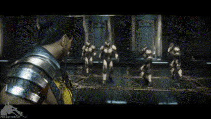 A Man In A Yellow Shirt Is Standing In Front Of A Group Of Robots GIF