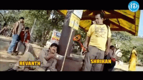 A Man In A Yellow Shirt Is Standing Next To Another Man In A Yellow Shirt With The Words Revanth And Shrihan On The Bott GIF