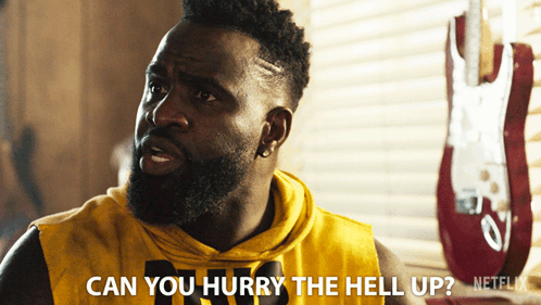 A Man In A Yellow Shirt Says " Can You Hurry The Hell Up Netflix " GIF