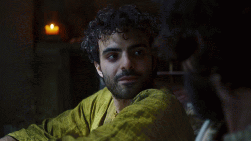 A Man In A Yellow Shirt Says That 'S Dark Next To Another Man GIF