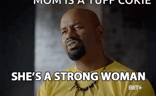 A Man In A Yellow Shirt With A Necklace Says She 'S A Strong Woman GIF