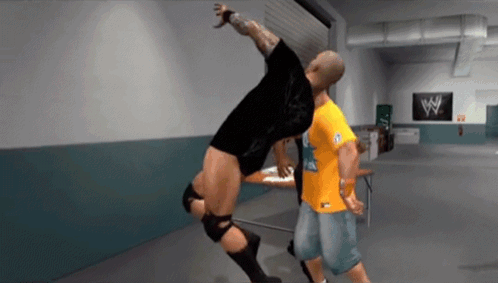 A Man In A Yellow Shirt With A W Logo On It GIF