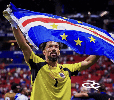 A Man In A Yellow Shirt With The Number 1 On It GIF