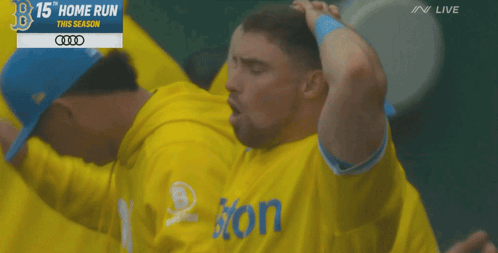 A Man In A Yellow Shirt With The Word Ion On It GIF