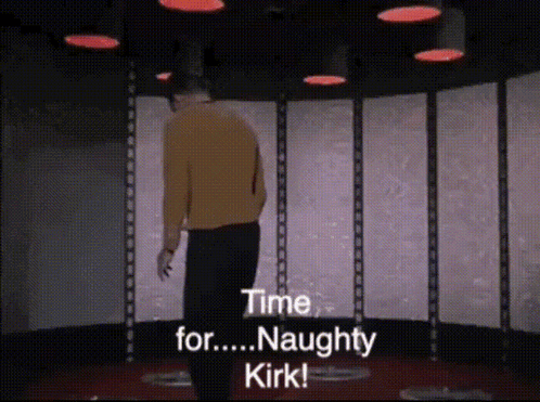 A Man In A Yellow Sweater Is Standing In A Room And Says " Time For Naughty Kirk " GIF