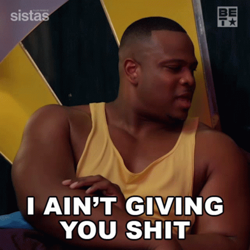 A Man In A Yellow Tank Top Is Saying " I Ain 'T Giving You Shit " GIF