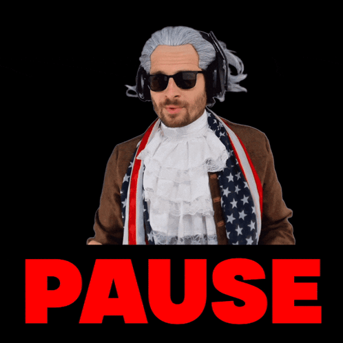 A Man In An American Flag Costume Is Making A Pause Gesture With His Hands GIF