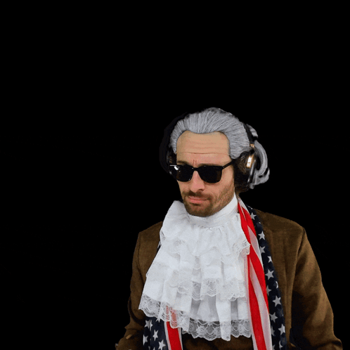 A Man In An American Flag Costume Is Pointing His Finger At The Word Blocked GIF