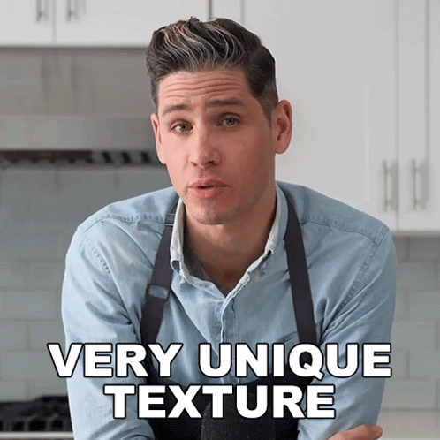 A Man In An Apron Says Very Unique Texture In A Kitchen GIF