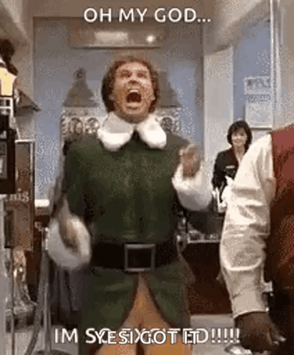 A Man In An Elf Costume Is Screaming In A Room . GIF