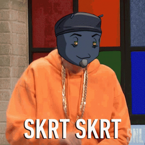 A Man In An Orange Hoodie Says Skrt Skrt In Front Of A Stained Glass Window GIF